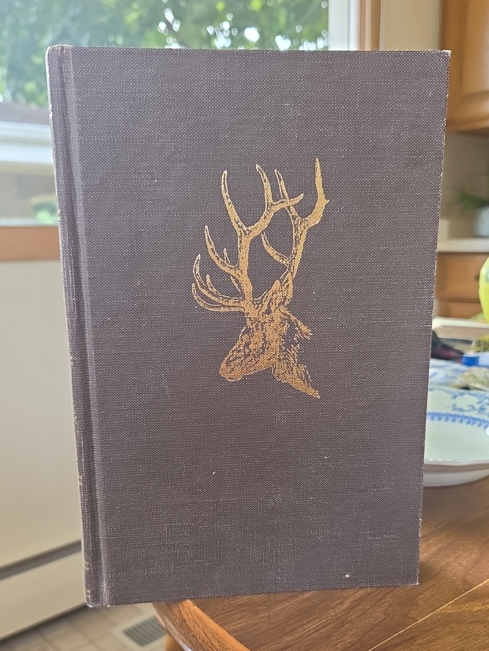 Brown Decorative Hardcover Coffee Table Book with Gold Stag Motif